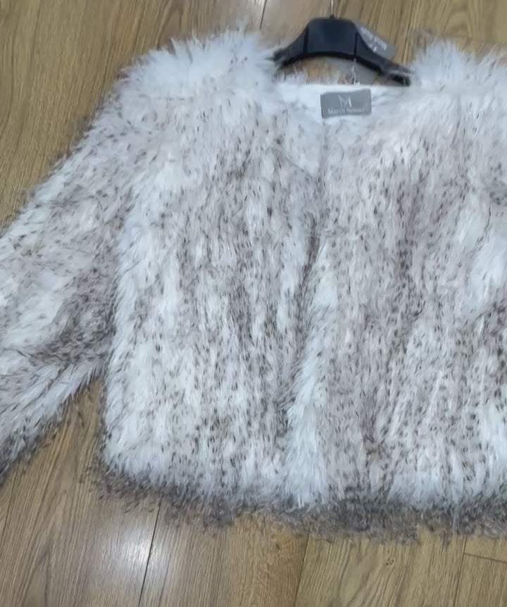 Pelliccia panna misto con beige chiaro